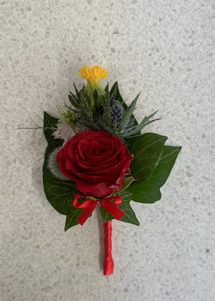 Gents Buttonhole with Red Rose, Blue Thistle and Yellow Carthamus